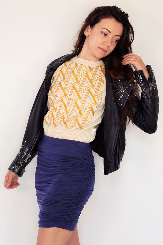 Womens sweater vest with art deco pattern in gold